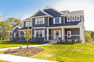 Suburban Lumber supplied the siding to this Cedar Rapids area home using Royal Vinyl in Marine Blue. To break up the long planks and add a bit of character, we added Royal Portsmouth Shingles, also in Marine Blue, along with white trim and corner accents.     