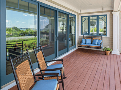 Another good example of a welcoming entryway featuring Marvin windows and doors. We love how the metal accents in the seating match the upper details in the sliding glass door.