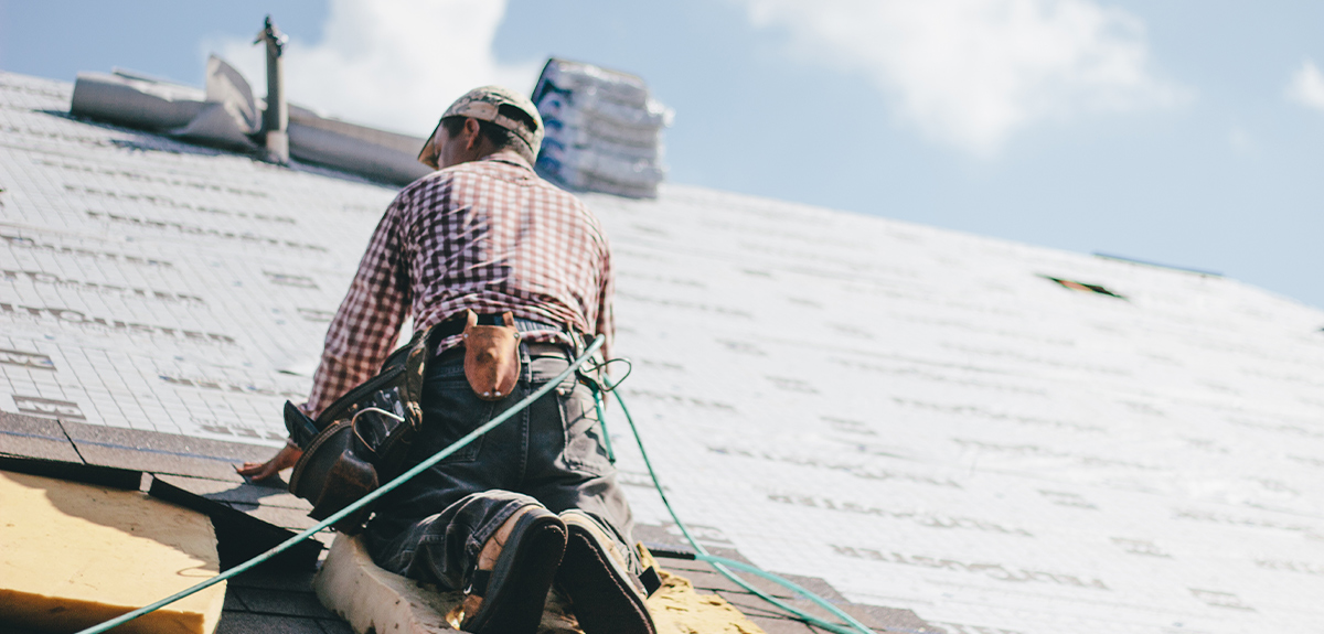 step 2 a man on a roof doing new rows for shingles 